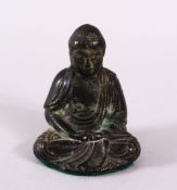 A CHINESE BRONZE FIGURE OF SEATED BUDDHA, seated with hands and legs crossed, the verso with a