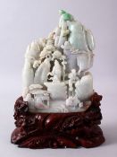 60A LARGER CHINESE CARVED JADEITE IMMORTAL & LANDSCAPE FIGURE, the stone carved with native