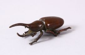 A JAPANESE BRONZE FIGURE OF A LONG HORN BEETLE - the base with a seal mark, 8cm