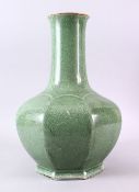 A LARGE CHINESE CRACKLEGLAZE GREEN OCTAGONAL BULBOUS VASE, 43cm high.