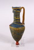 A GOOD SANCOR GLASS VASE, with a handle and moulded top, with yellow inclusion decoration, 14cm
