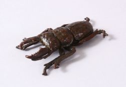 A JAPANESE BRONZE FIGURE OF A BEETLE, The underside with a seal mark, 6.5cm