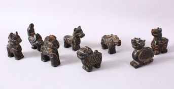 A MIXED LOT OF CHINESE CARVED DARK HARDSTONE FIGURES, of various animals, tigers, rams, horses
