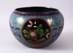 A CHINESE CLOISONNE JARDINIERE, decorated with panel of native flora, with formal lotus decoration