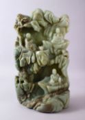 A LARGE AND HEAVY CHINESE CARVED JADE BOULDER - BUDDHA - the large heavy boulder carved in fine