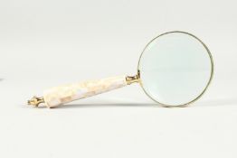 A MAGNIFYING GLASS WITH MOTHER OF PEARL HANDLE