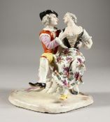 AN 18TH CENTURY FURSTENBERG PORCELAIN GROUP OF YOUNG LOVERS. 6ins high. One arm missing.