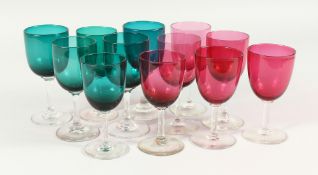 TWELVE VICTORIAN GLASSES, 6 cranberry and 6 green Victorian wines.