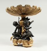 A SUPERB BRONZE AND GILT BRONZE TAZZA with three cupids holding a shell. 13ins long.