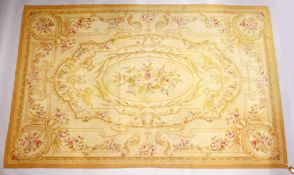 AN AUBUSSON TAPESTRY IN 18TH CENTURY STYLE, cream ground with floral sprays within classical panels.
