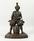 AN AMUSING CAST IRON DOOR STOP 