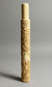 A CHINESE CARVED BONE CIGAR HOLDER.