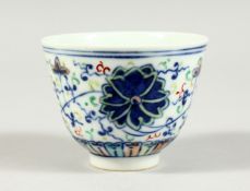 A CHINESE BLUE AND WHITE CIRCULAR BOWL, square blue mark. 2.75ins diameter.