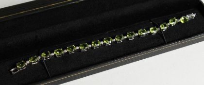 A PERIDOT SET LINE BRACELET