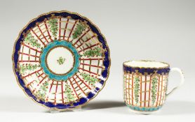A WORCESTER COFFEE SUP AND SAUCER of fluted form painted with a blue, turquoise and gold version