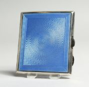 A TWO SIDED BLUE ENAMEL AND SILVER CIGARETTE CASE Birmingham, 1930.