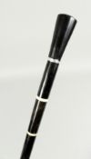 A VICTORIAN EBONY AND IVORY CANE 35ins long.