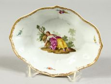 AN 18TH CENTURY MEISSEN PORCELAIN OVAL DISH edged in gilt and painted with a lady sleeping. Cross