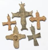 FIVE MEDIUM ROMAN IRON CROSSES.