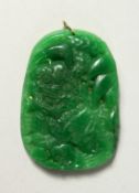 A CARVED CHINESE JADE PENDANT