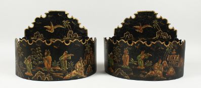 A PAIR OF BLACK TOLE WARE WALL POCKETS,Chinese design 11ins wide
