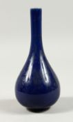 A CHINESE BLUE LONG NECK VASE.
