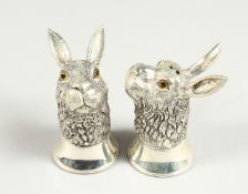 A PAIR OF .925 SILVER PLATE RABBIT'S HEAD SALT AND PEPPERS