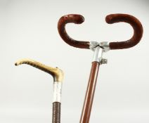 A SWAIN-BRIGG SHOOTING STICK and a bone handled whip.(2). 34ins long.