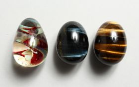 THREE MULTI-COLOURED EGGS 4cm.