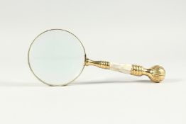 A MAGNIFYING GLASS WITH MOTHER OF PEARL AND GILT HANDLE