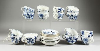 A QUANTITY OF MEISSEN BLUE AND WHITE ONION PATTERN CUPS AND SAUCERS, fifteen various cups and