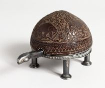 A RARE COCONUT CASED TORTOISE SHAPED CLOCK, the movement by Lichten in wein standing on a silver