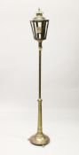 A BRASS LANTERN LAMP 6ft high