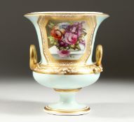 A DERBY COMPOUND TWO HANDLED URN, painted with a panel of flowers. 6.5ins high. AF