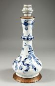A MEISSEN PORCELAIN BLUE AND WHITE LAMP of the onion pattern, on a metal base 14ins high.