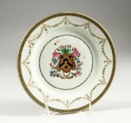 A PAIR OF SAMSON OF PARIS FAMILLE ROSE CIRCULAR ARMORIAL PLATES 8ins diameter.