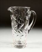 A CLYNE FARQUARSON SIGNED LEAF PATTERN JUG. 9ins high