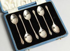 A SET OF SIX STERLING SILVER COFFEE SPOONS cased Birmingham 1957