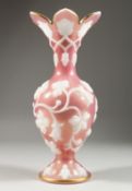 A GOOD BOHEMIAN PINK GLASS VASE, with pink flowers in relief. 11ins high