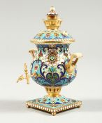 A GOOD SMALL RUSSIAN SILVER GILT AND CHAMPLEVE ENAMEL MINIATURE SAMOVAR, stamped 84 4ins high.