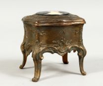 AN ART DECO DESIGN BRASS AND ENAMEL JEWELL CASKET. 3ins long.