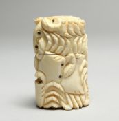 A BONE BOX CARVED WITH CRABS