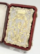 A VICTORIAN SILVER AND SILVER GILT CALLING CARD CASE Biimingham 1857, maker A.T., in a fitted case.