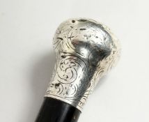 A VICTORIAN CANE with silver handle. Birmingham, 1871 35ins long.