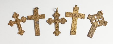 FIVE VARIOUS GILDED CROSSES, 2.25 to 3.5 inches long