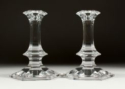 A PAIR OF VAL ST. LAMBERT OCTAGONAL GLASS CANDLESTICKS 6ins high.