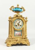A GOOD LOUIS XVITH DESIGN GILT SEVRES AND PORCELAIN CLOCK with urn final, column supports and Sevres