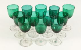 TWELVE MIXED VICTORIAN GREEN TINTED WINE GLASSES