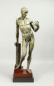 A FINE BRONZE ANATOMICAL STANDING MAN, beside a column on a stepped base. Signed FRANZ STUCK. No.