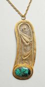 A FILIGREE AND MALACHITE PENDANT